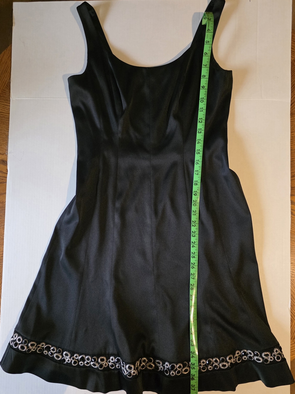 Jones Wear Black Sleeveless Midi Dress with Silver Ring Hem Detail- added photos